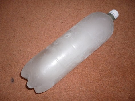 In place of a foam roller I am using a 2 litre frozen bottle of water